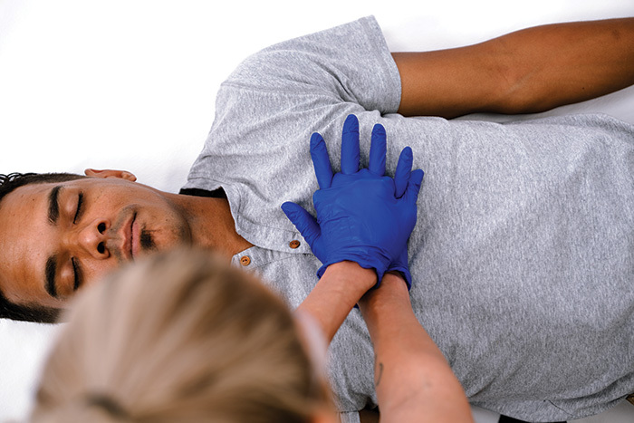 CPR Compressions Hands ariel view CPR Compressions Hands ariel view